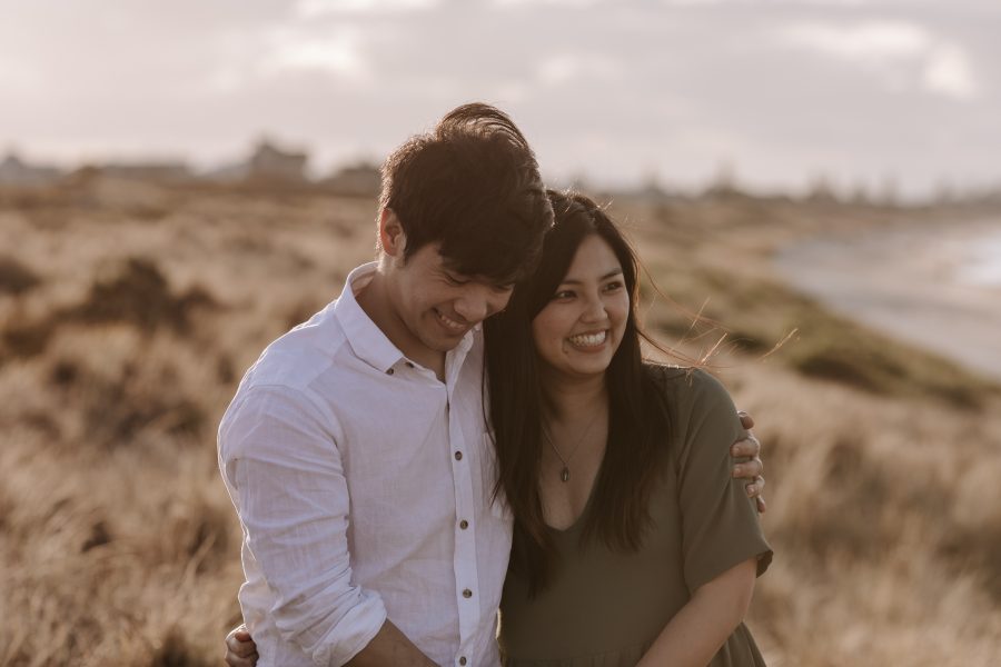 natural happy moment at golden hour on dunes