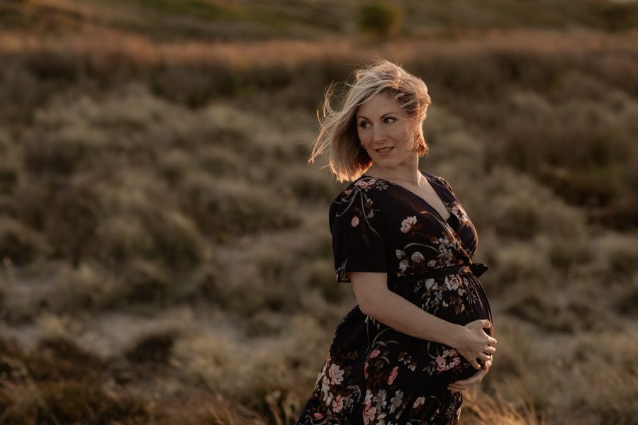 Candid moment of golden hour photos for lifestyle maternity photos