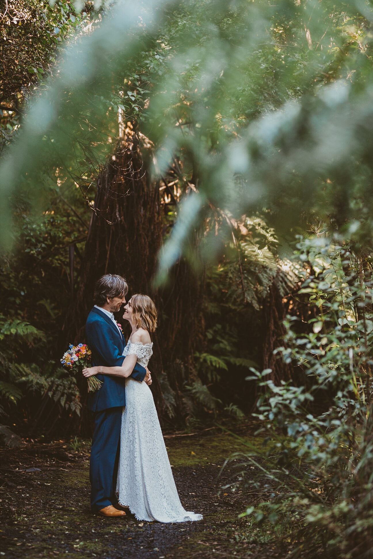 Waihi Reserve bride and groom looking at eachother