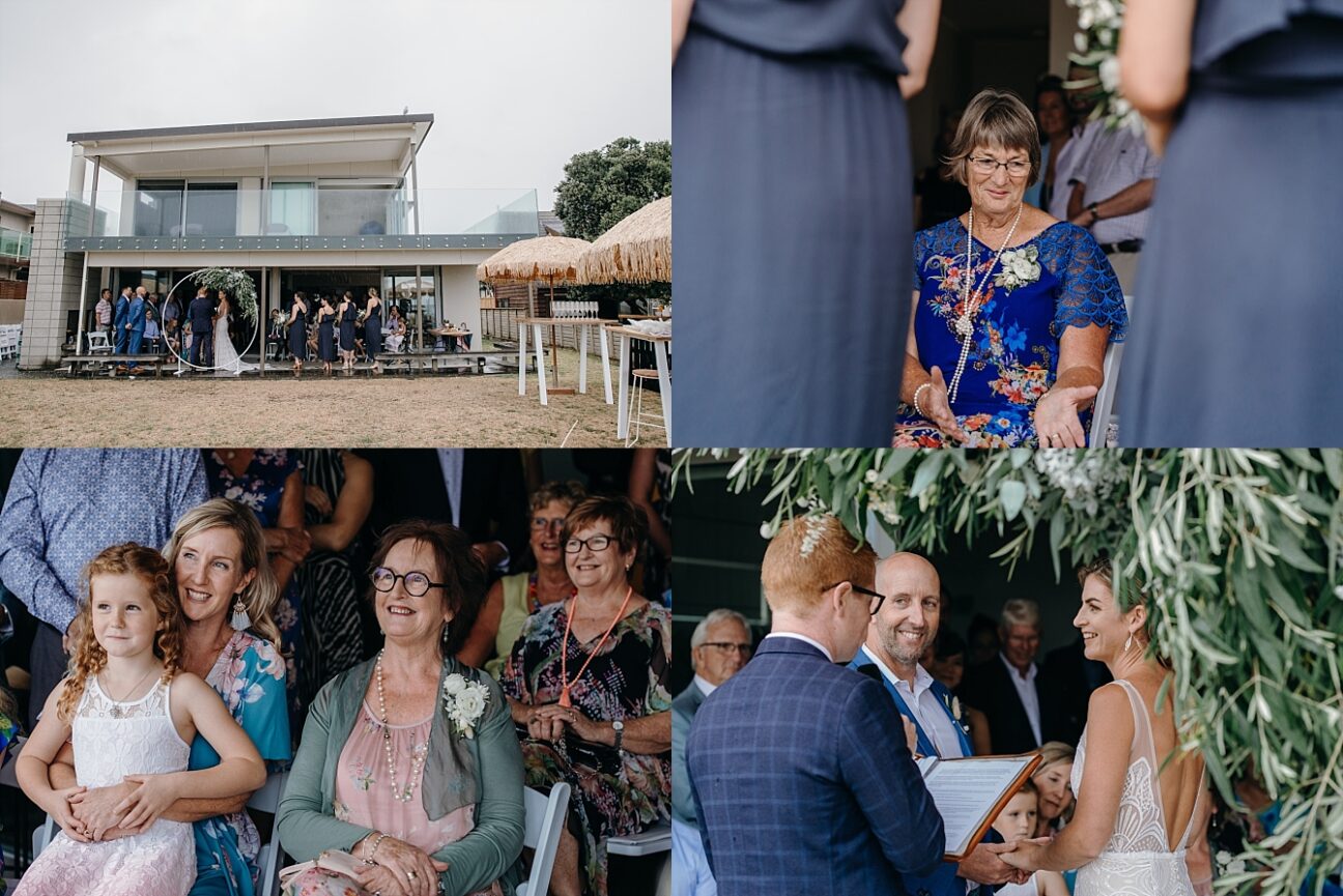 Wedding ceremony in progress at Whangamata beach wedding in the rain