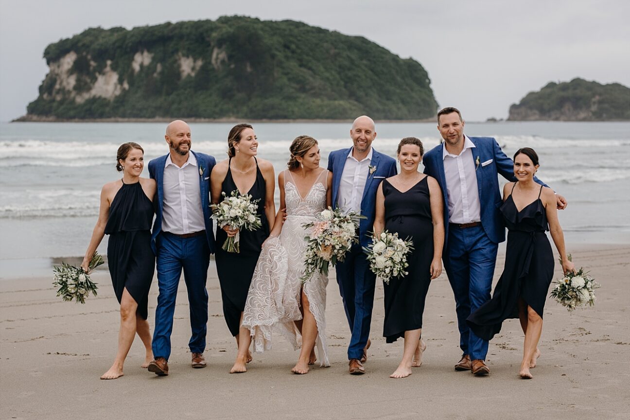 Happy wedding party on Coromandel Beach