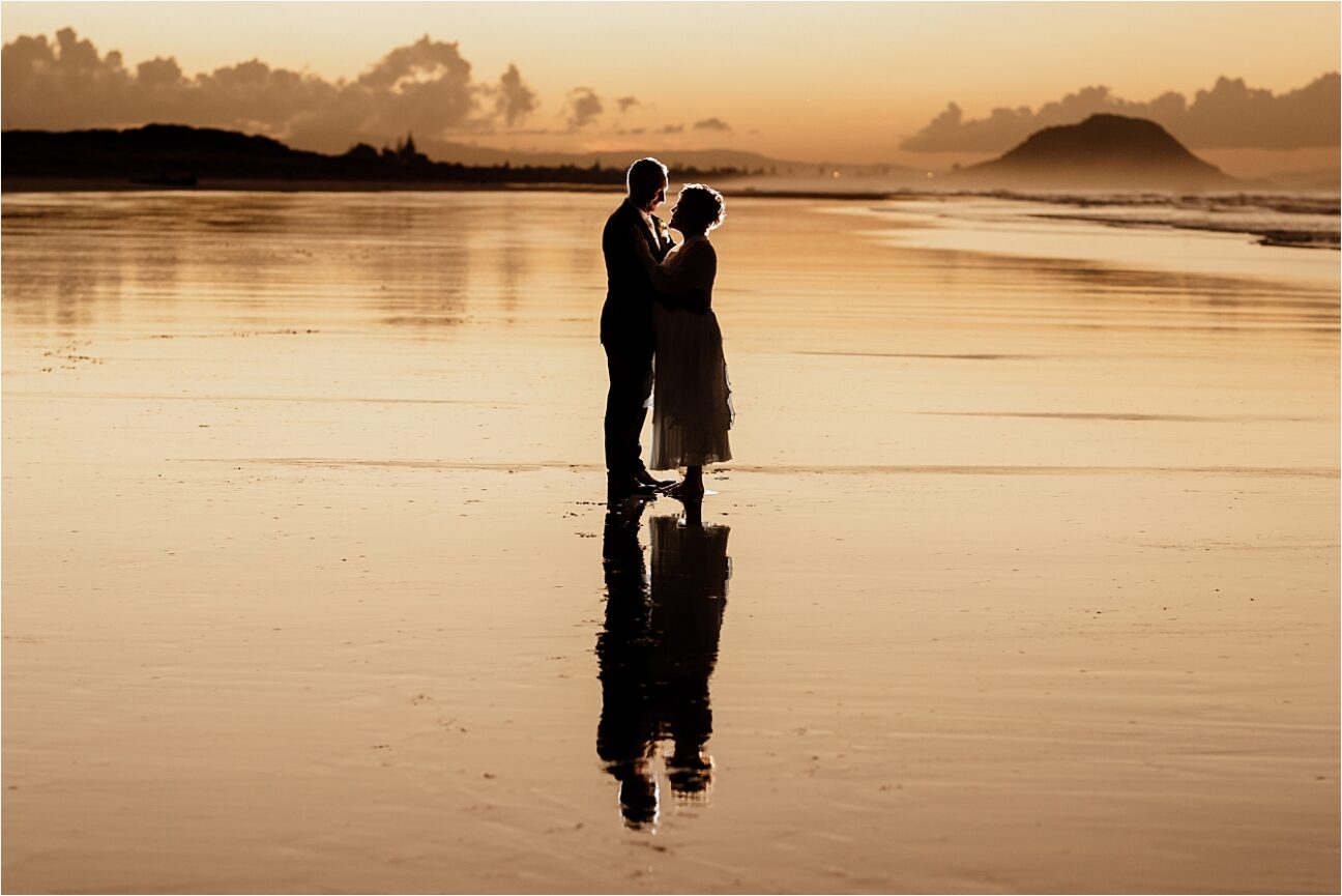 Papamoa Beach bride and groom photos sunset