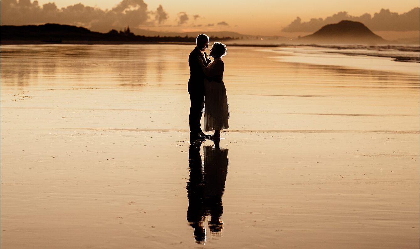 Papamoa Beach bride and groom photos sunset