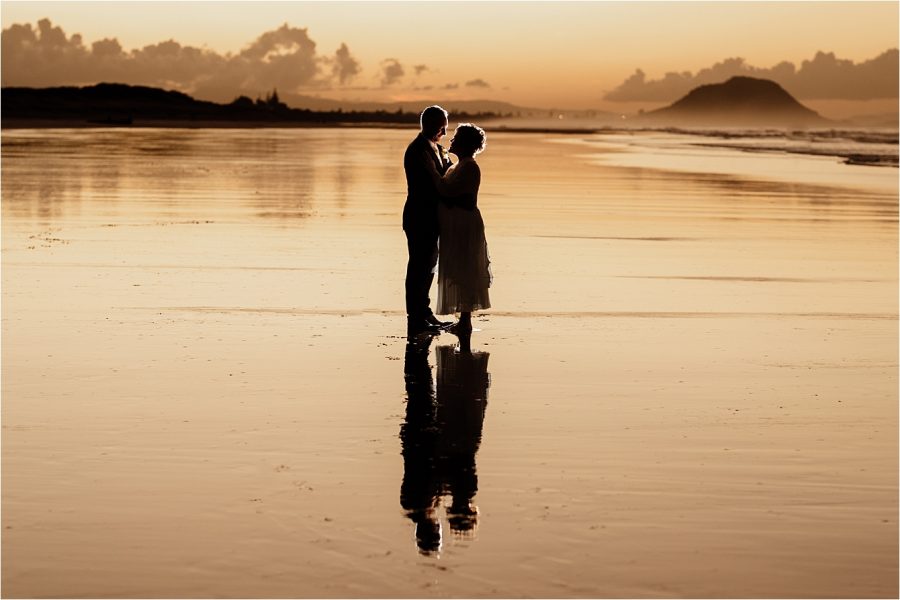 Papamoa Beach bride and groom photos sunset