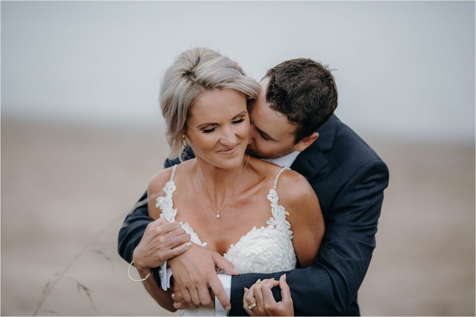 Natural intimate moments wedding couple