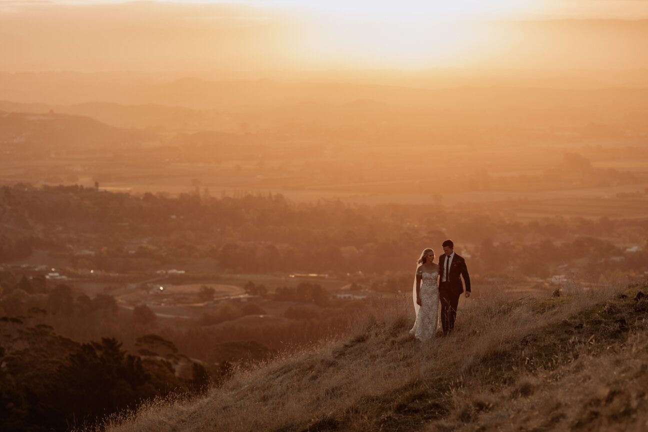 Golden hour elopement photo at Te Mata peak with Pure Images Photography