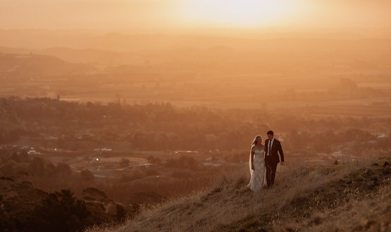 Golden hour elopement photo at Te Mata peak with Pure Images Photography