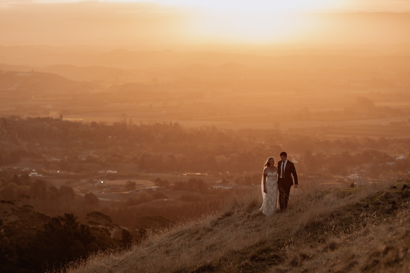 Golden hour elopement photo at Te Mata peak with Pure Images Photography