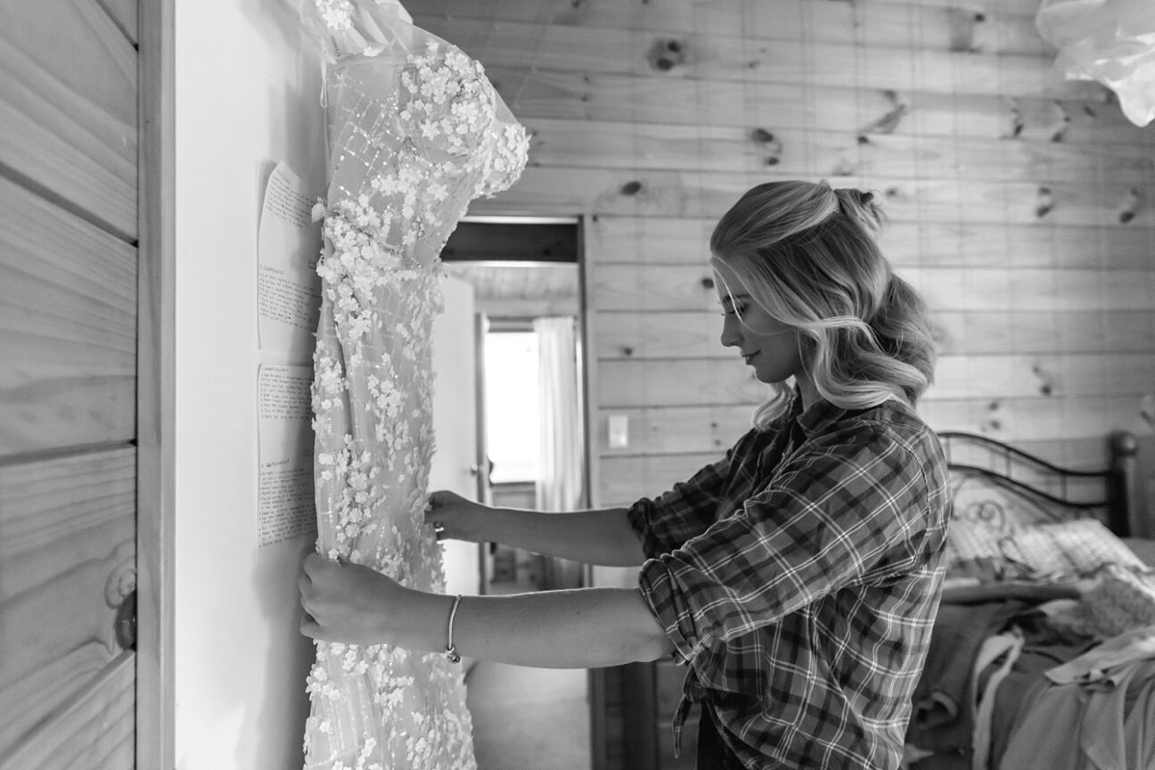 Bride looks at wedding dress for the first time
