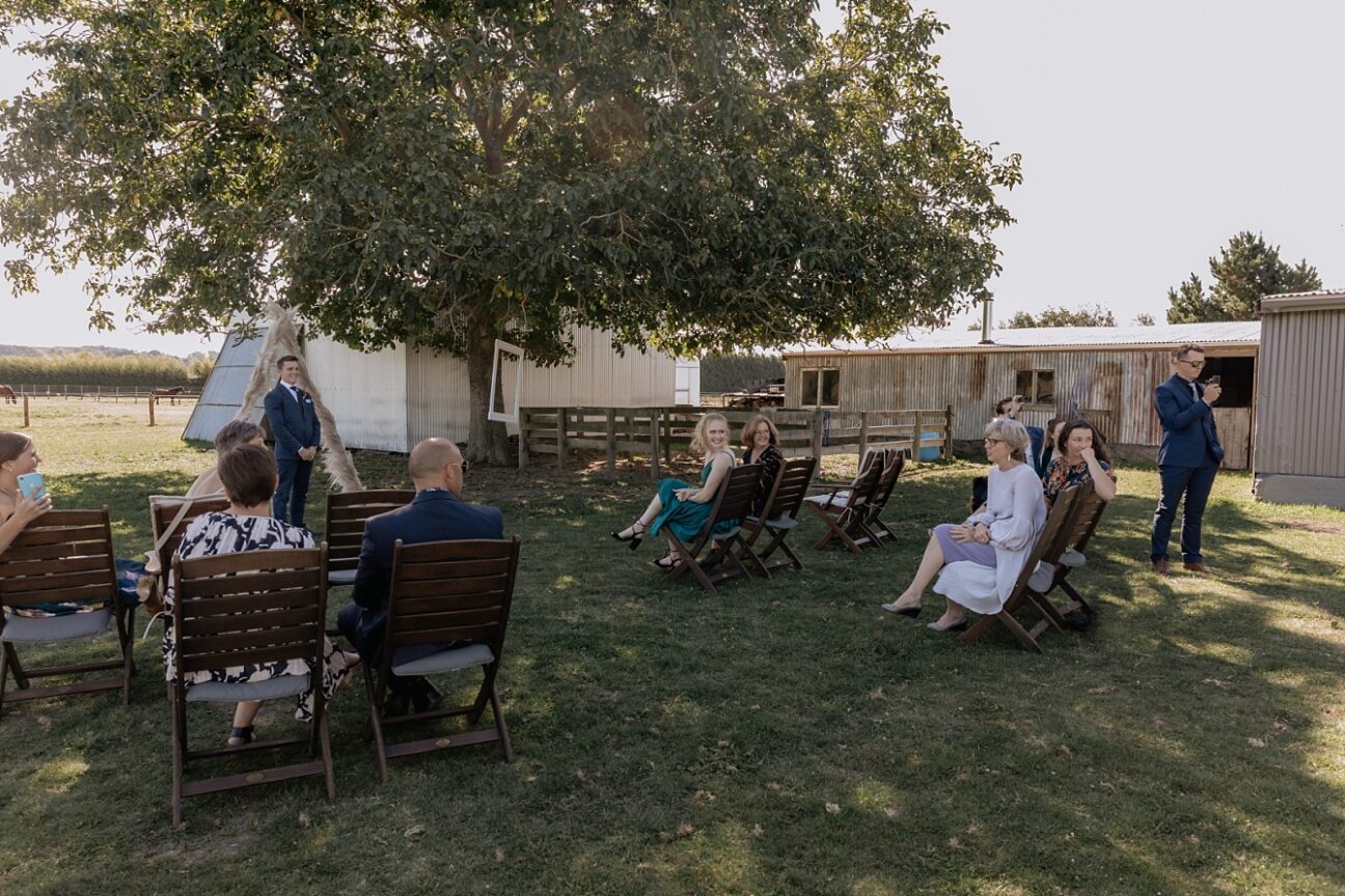Guests watching bride arrival