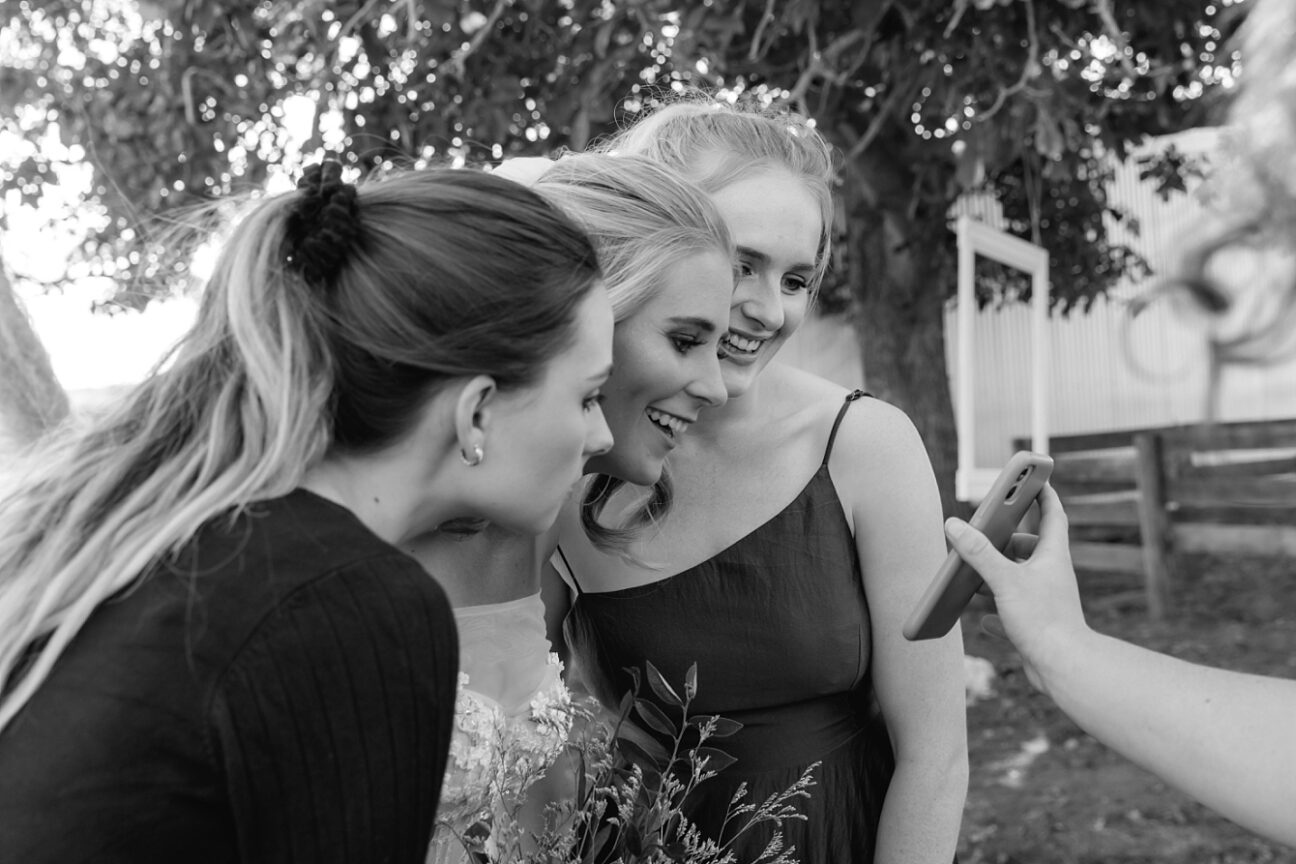 Candid moments with friends at wedding