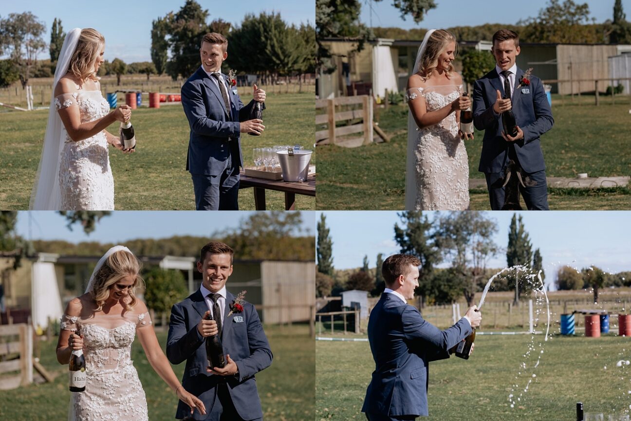 Bride and groom popping champagne