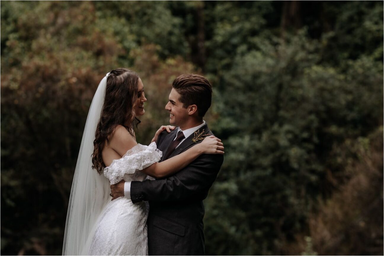 Fun natural laughing moment with bride and groom