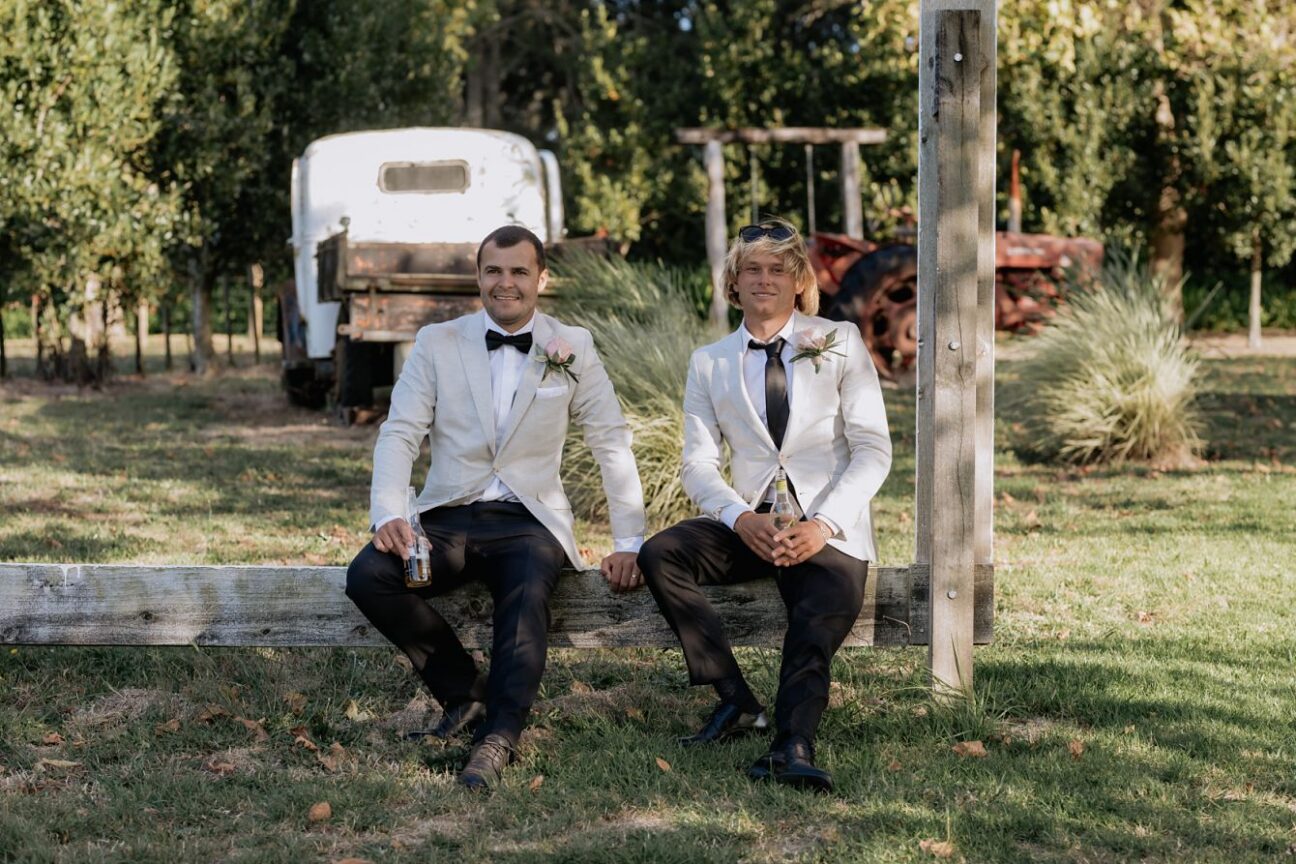 Groomsmen chilling out drinking a beer