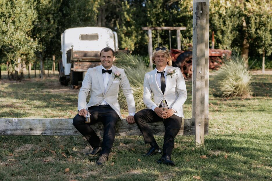 Groomsmen chilling out drinking a beer
