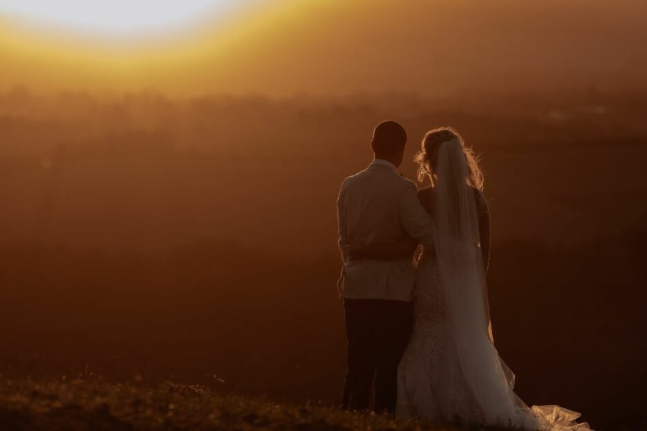 bride and groom enjoying golden hour