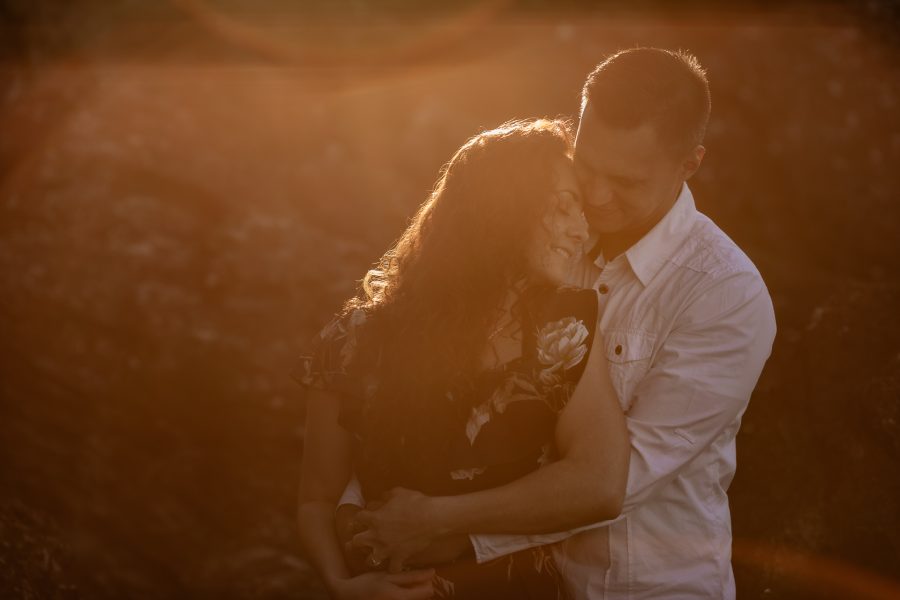 Photo shoot of couple in love sunlit hair