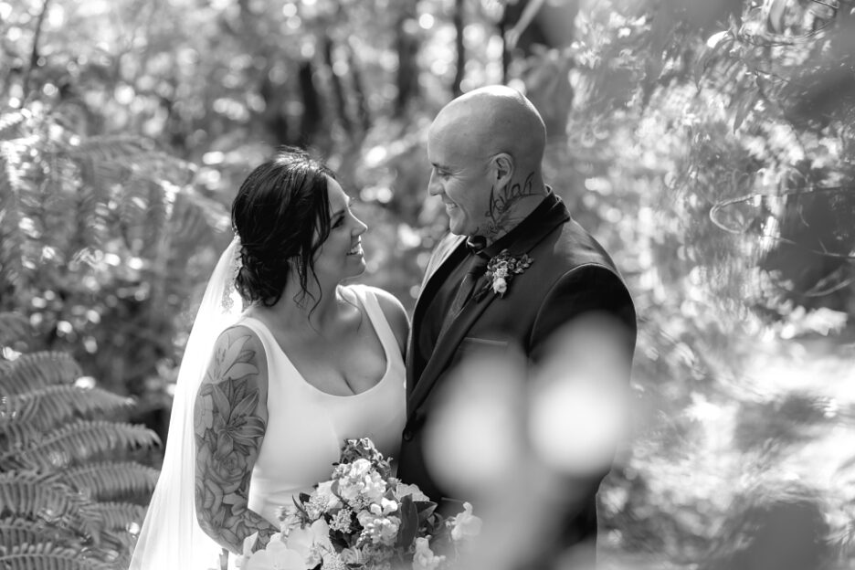 Candid moments in the bush in NZ Wedding
