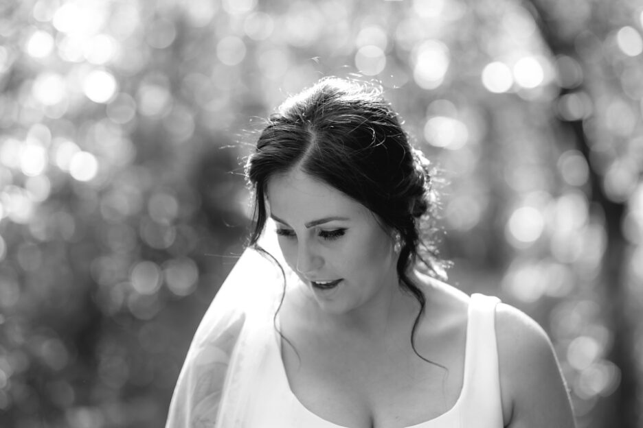 Candid natural moment of bride in garden