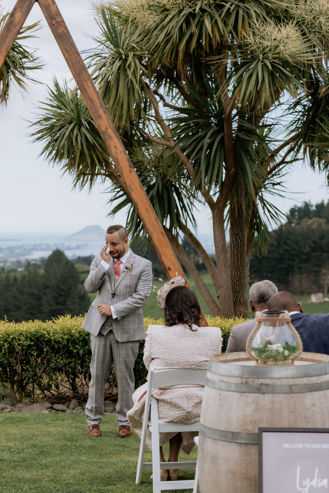 Emotional crying groom on seeing his bride