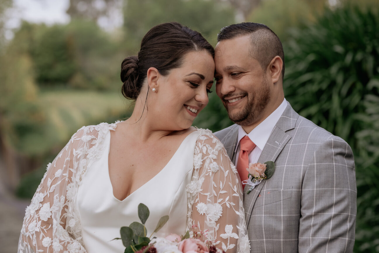 Bride and groom cuddling
