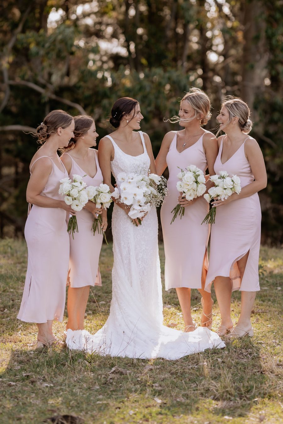 Pink bridal squad laughing