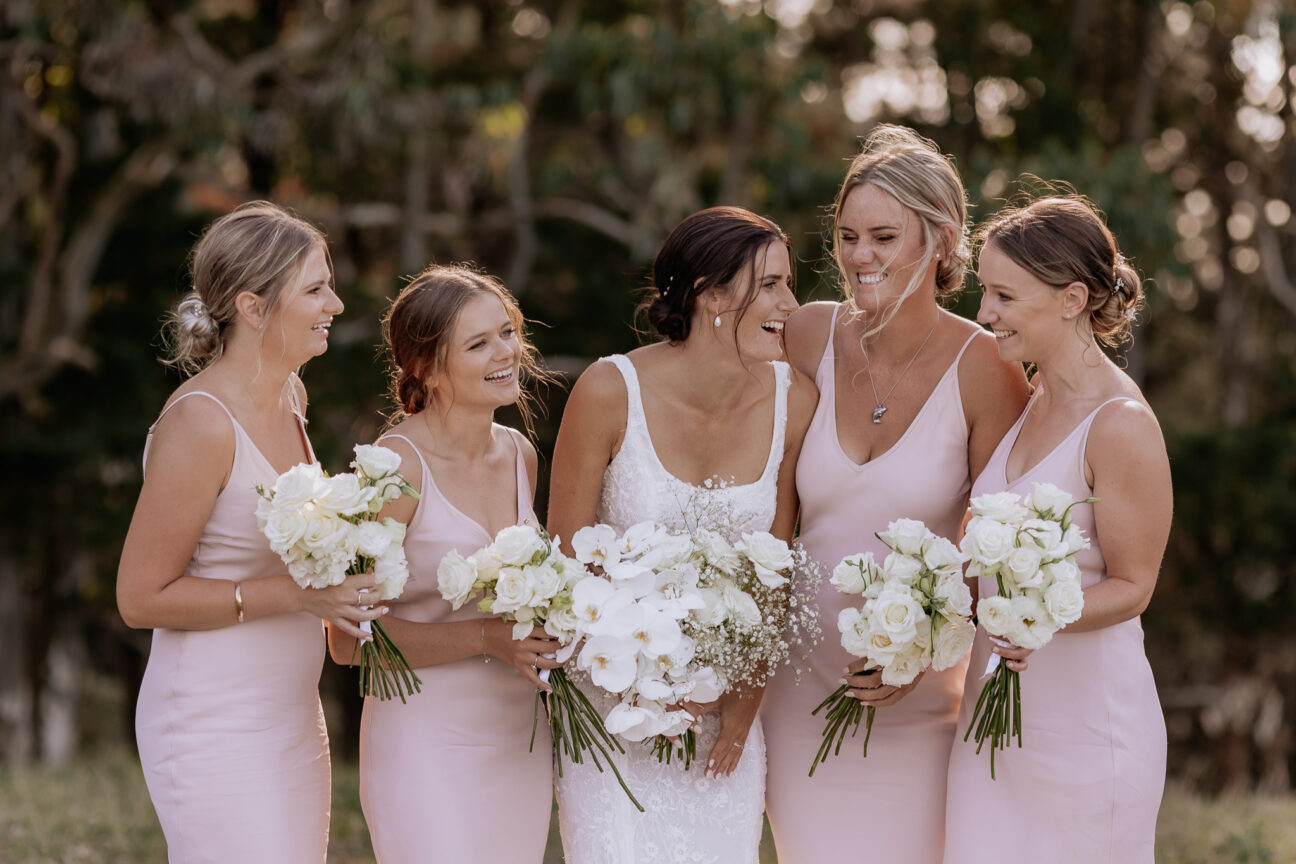 Bridal party happy photos in pink dresses