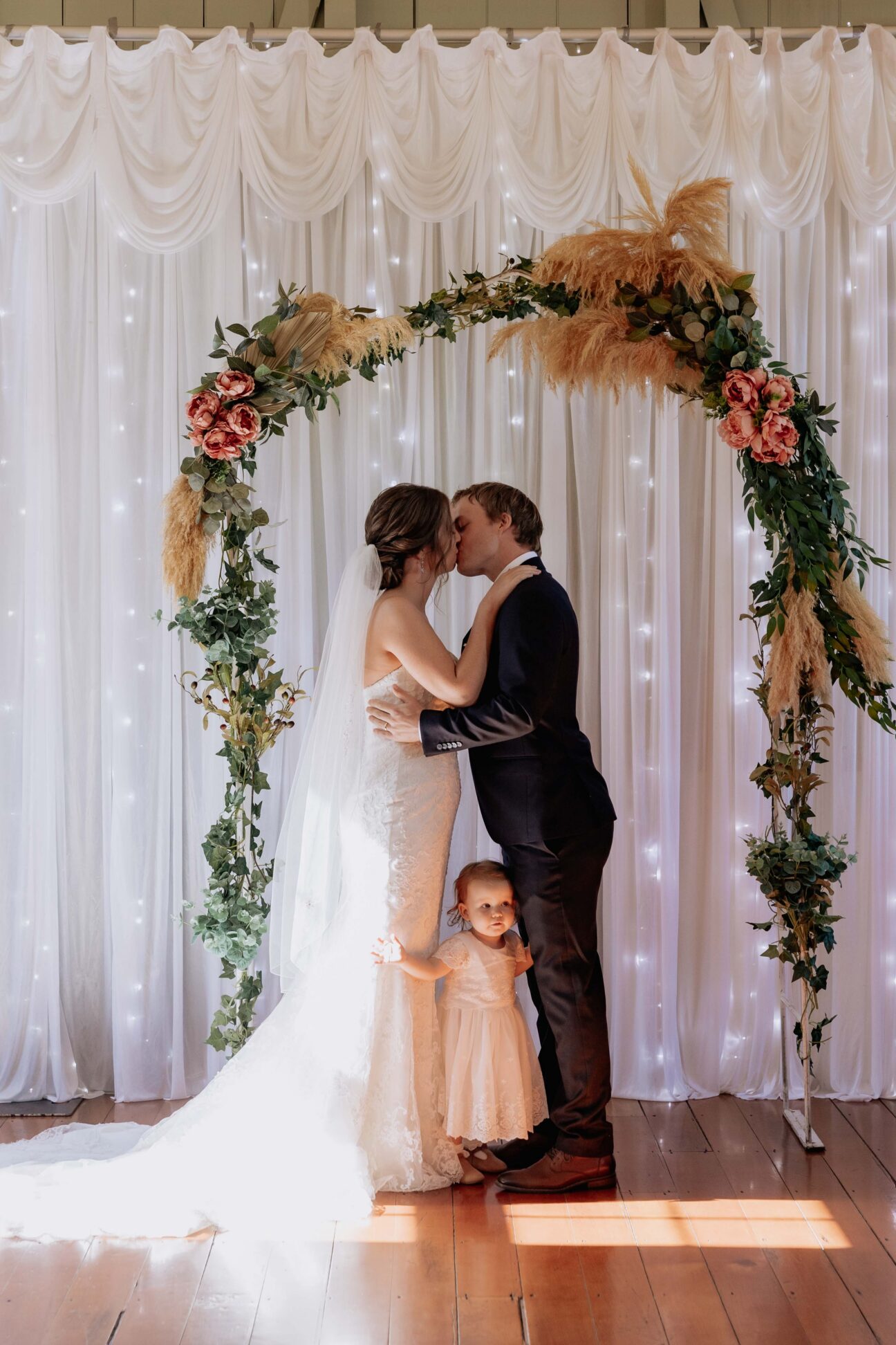 First kiss with daughter between them