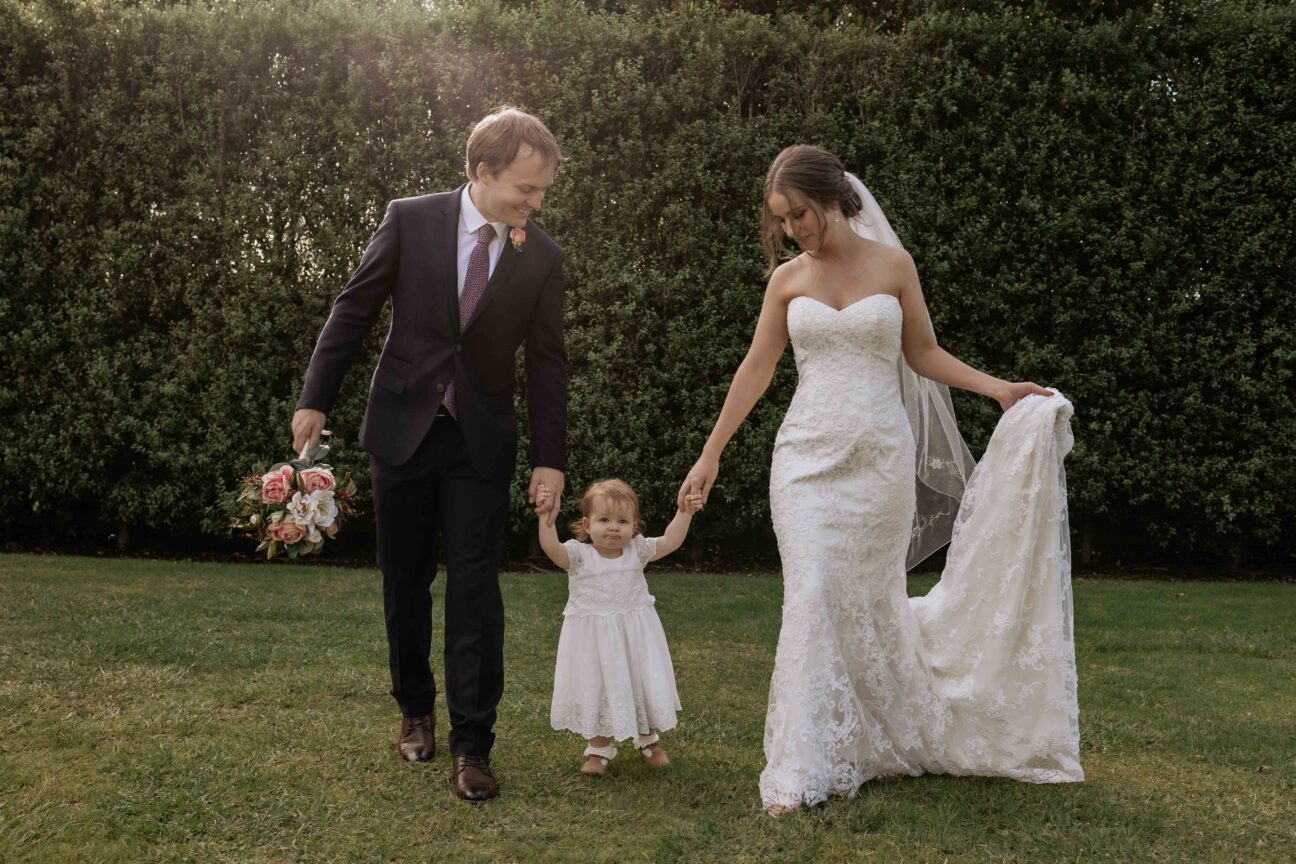 Bridal couple with daughter