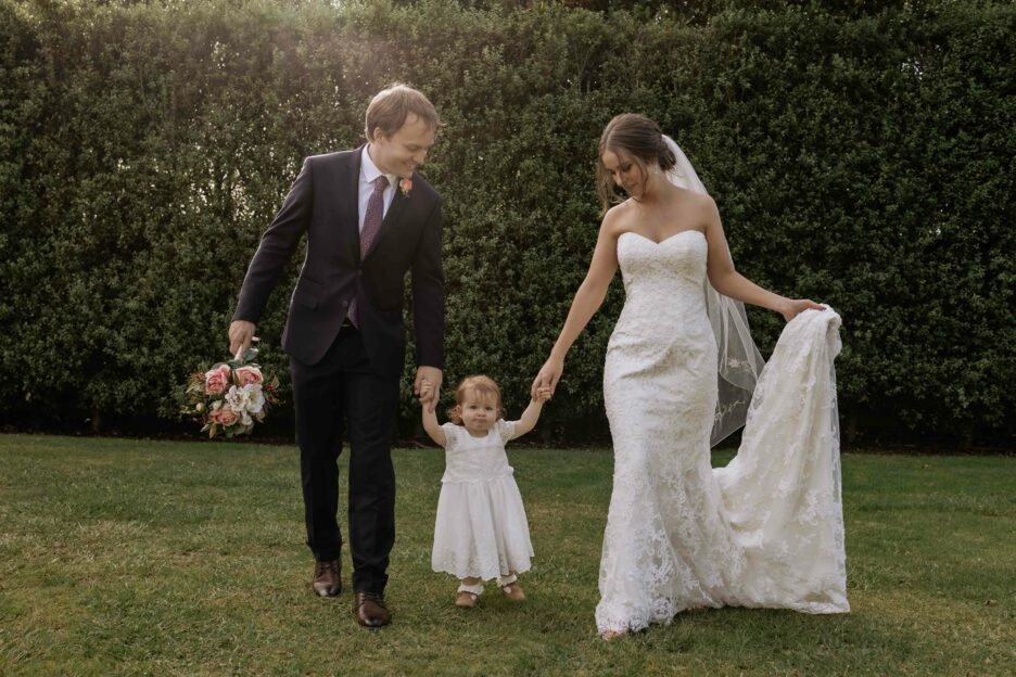 Bridal couple with daughter