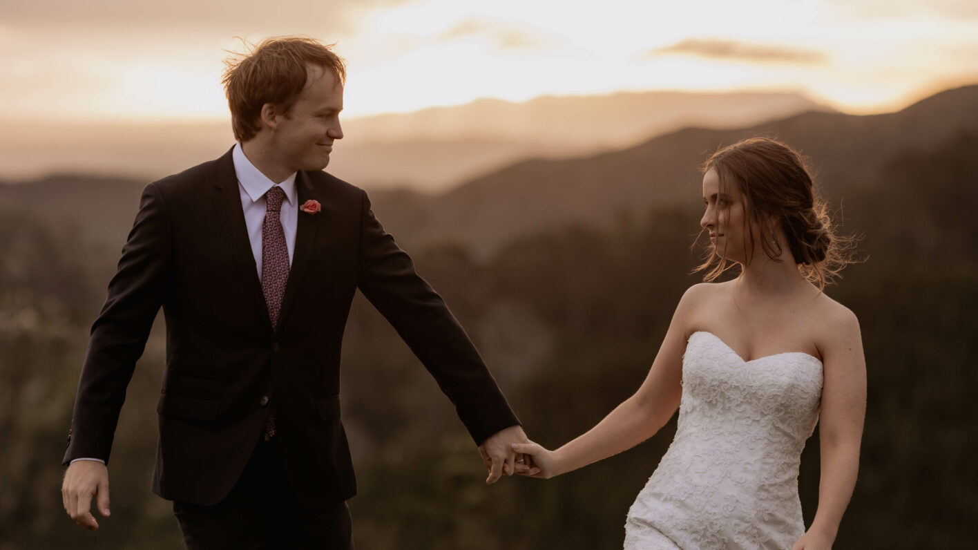 happy wedding photo captured on their wedding day as the sun sets