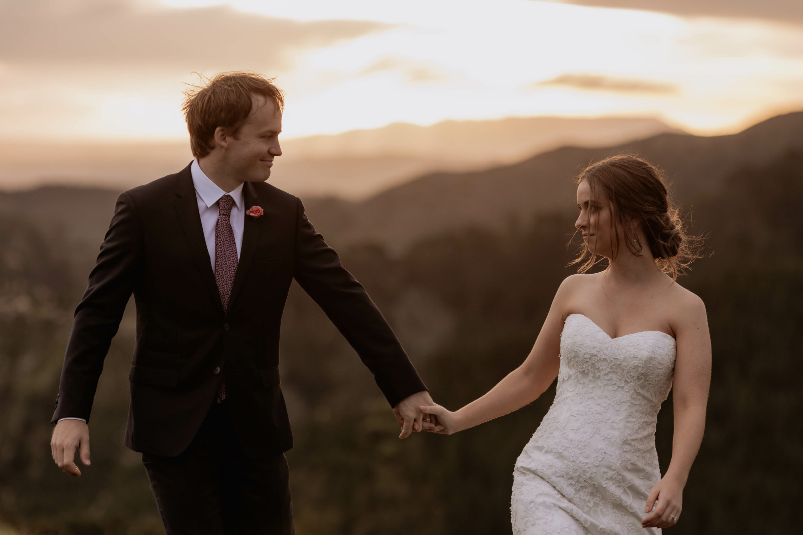 happy wedding photo captured on their wedding day as the sun sets