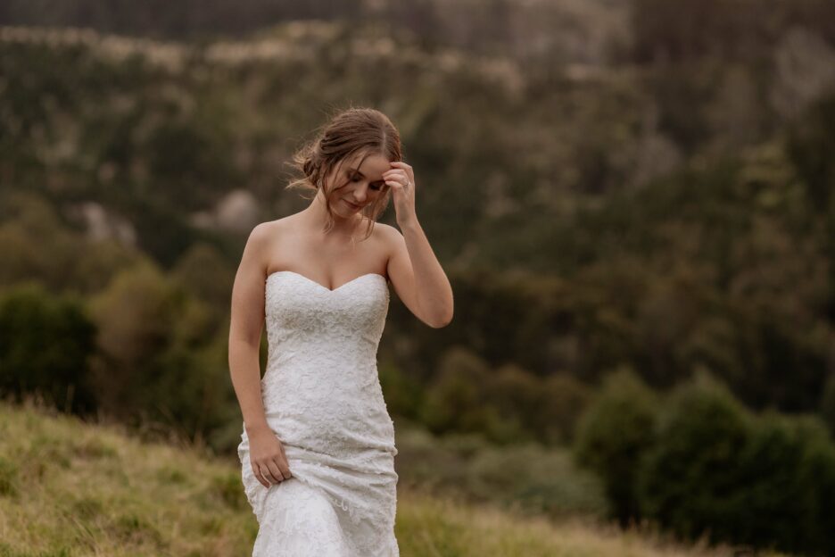 bridal portrait moves hair off face