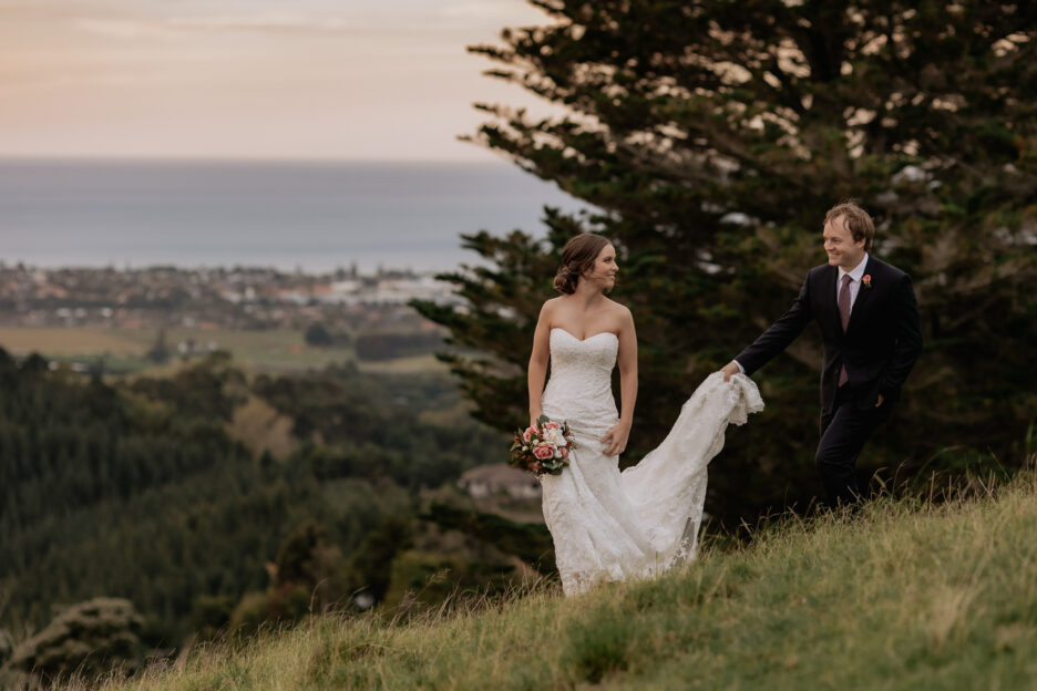Wedding couple with beach scenes behind them