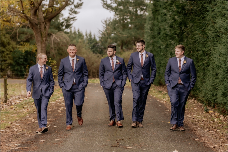 Groom with groomsmen walking