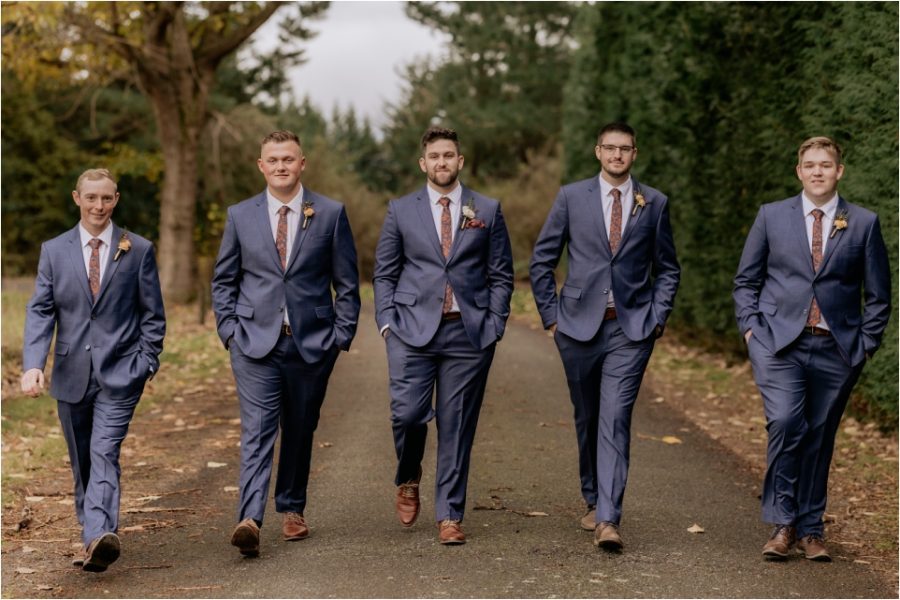 Groomsmen in navy suits at Makoura Lodge