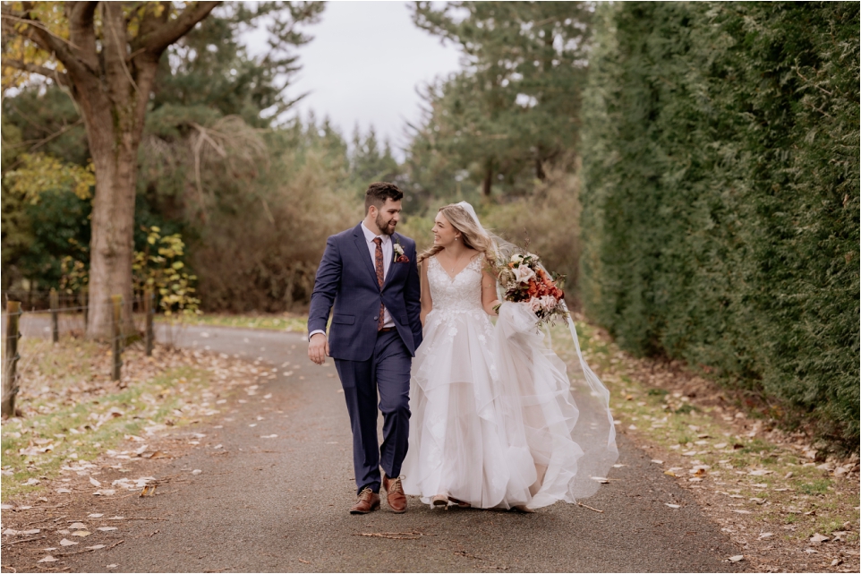 Bride and groom looking at each other at Makoura Lodge