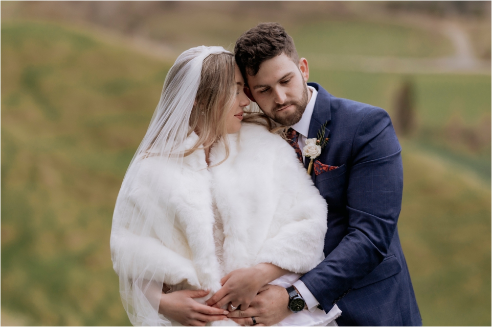 Initimate moments with wedding couple on the farm