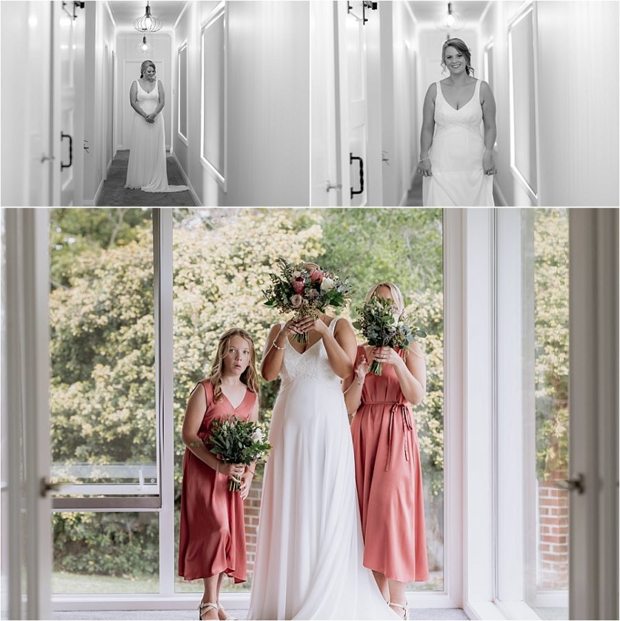 Bride with bridesmaids in coral dresses