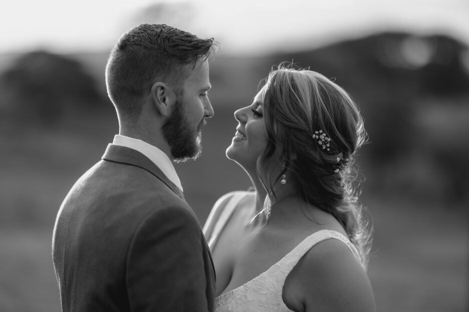 intimate moments with bride looking at her husband