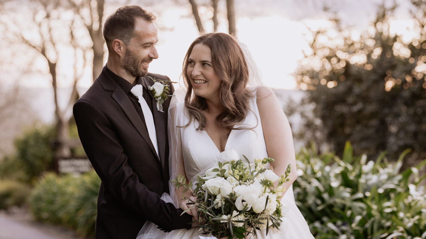 bride and groom laughing