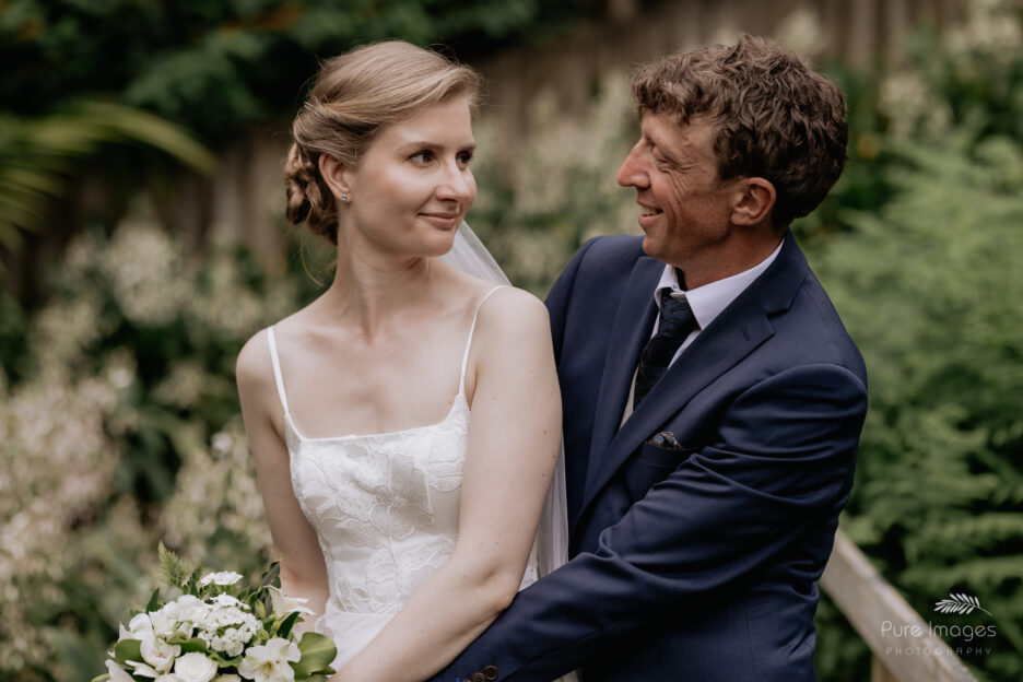 Wedding couple during wedding photography looking at each other