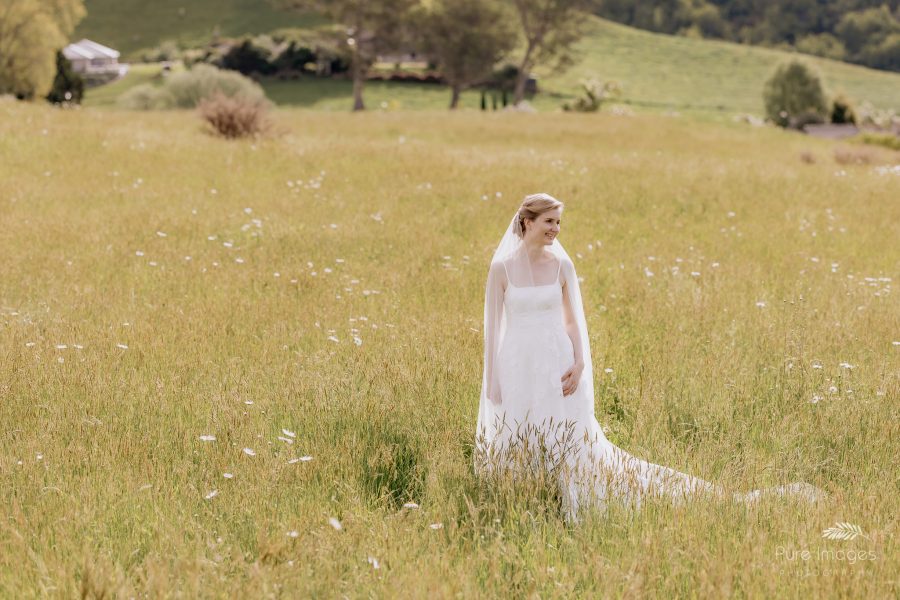 Country bride in daisy field