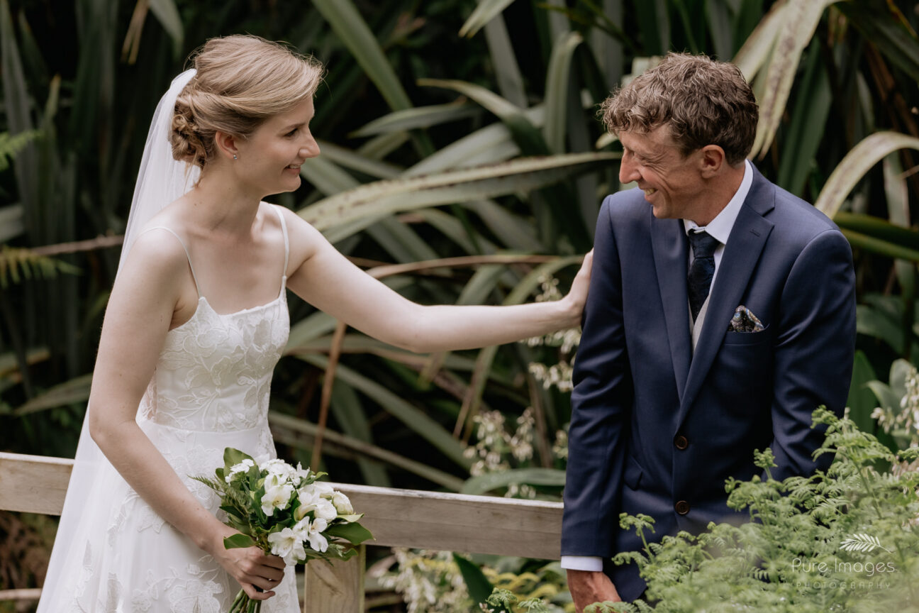 wedding couple greet at end of aisle at backyard wedding