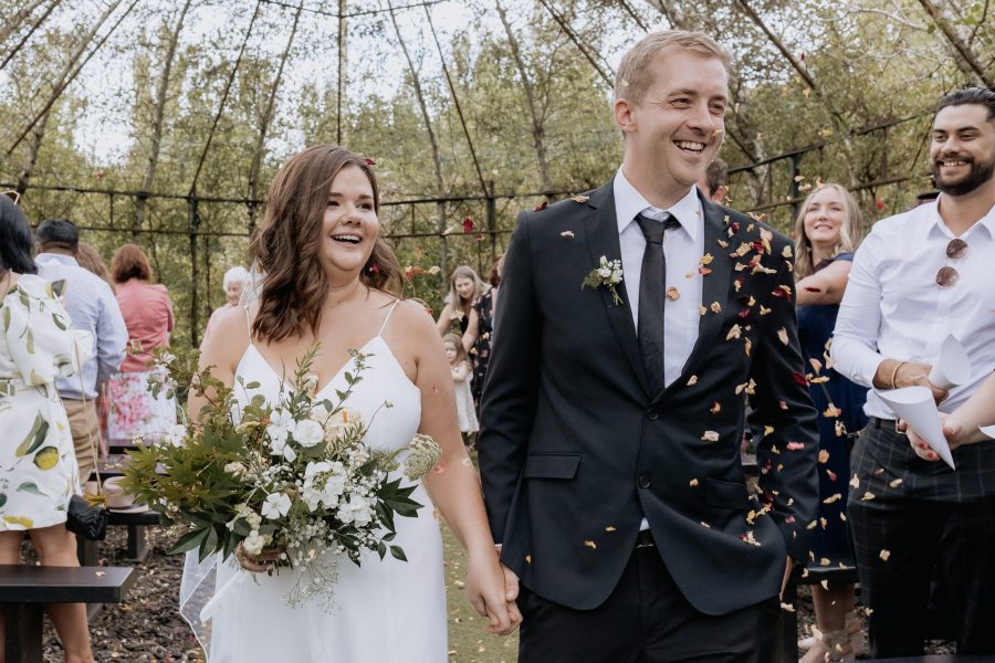 Waikato wedding couple walking aisle