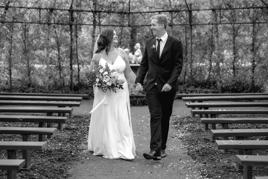 Happy couple inside the waikato tree church