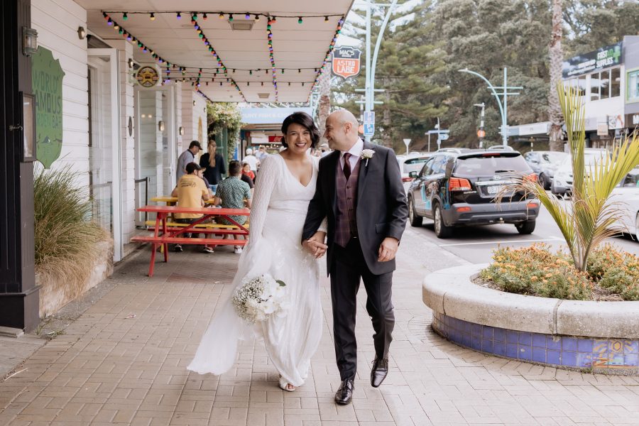 Mount Maunganui urban wedding photo shoot main street walking hand in hand