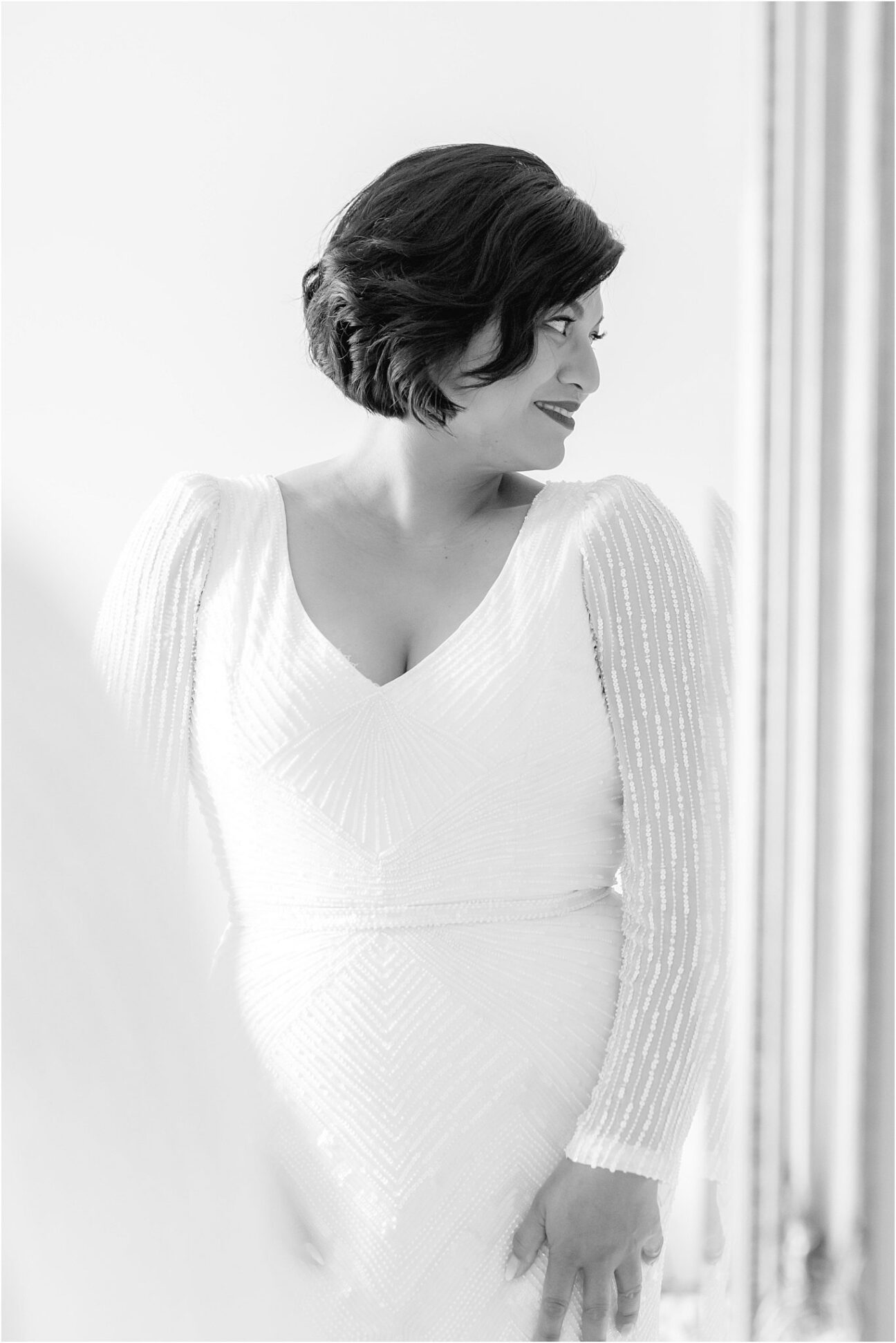 Bridal portrait looking at mirror