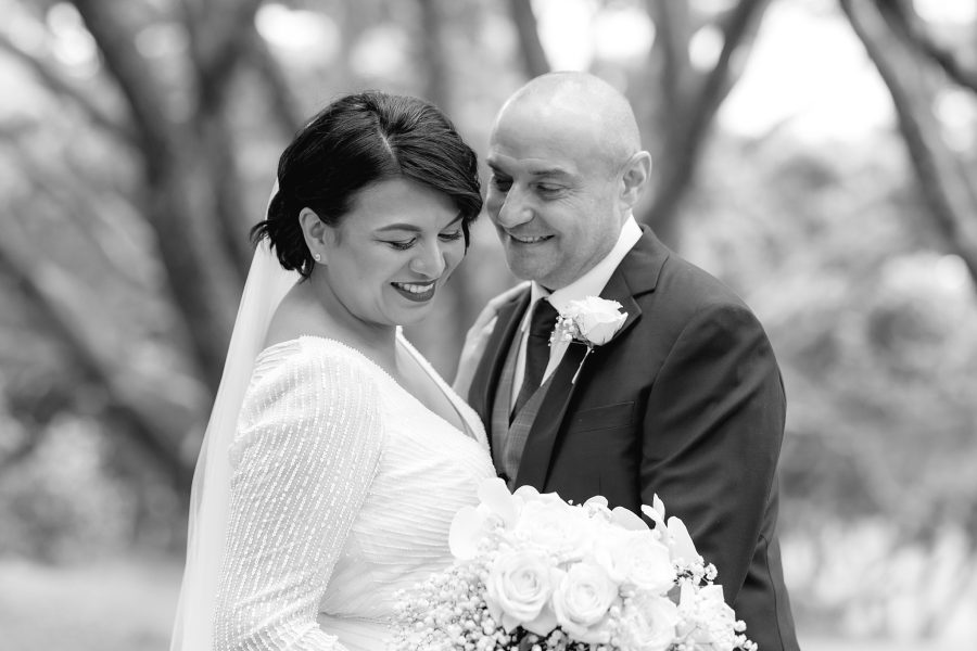 Wedding couple laughing together