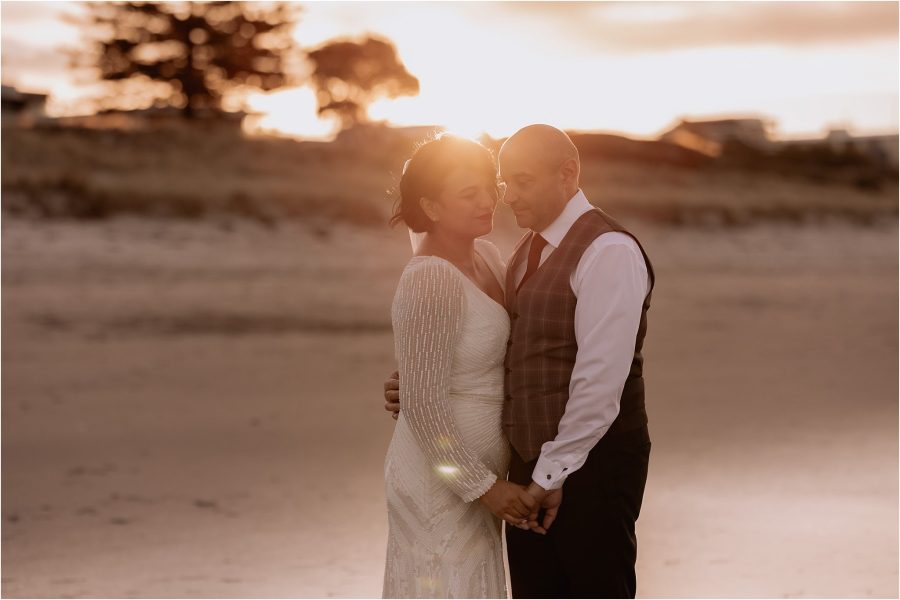 Wedding photos on Mount maunganui beach at sunset